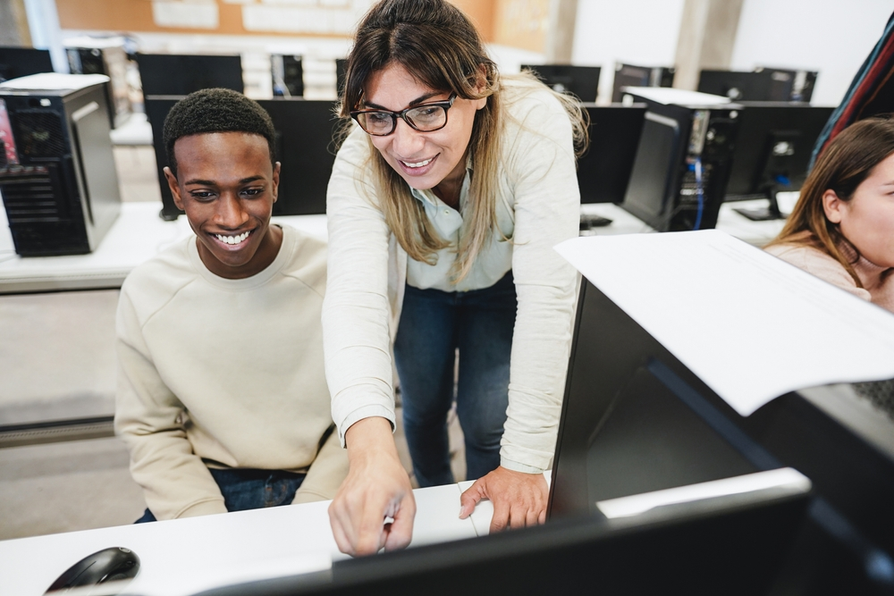 Students collaborating at computer