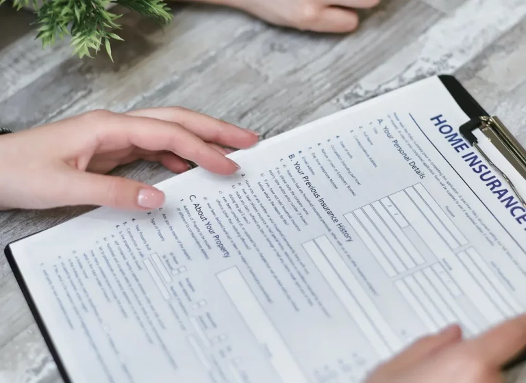 A clipboard with insurance papers