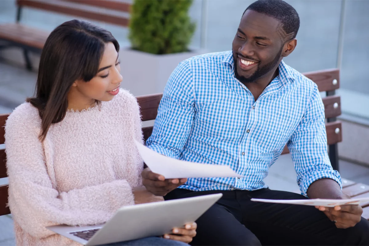 Two founders reviewing documents