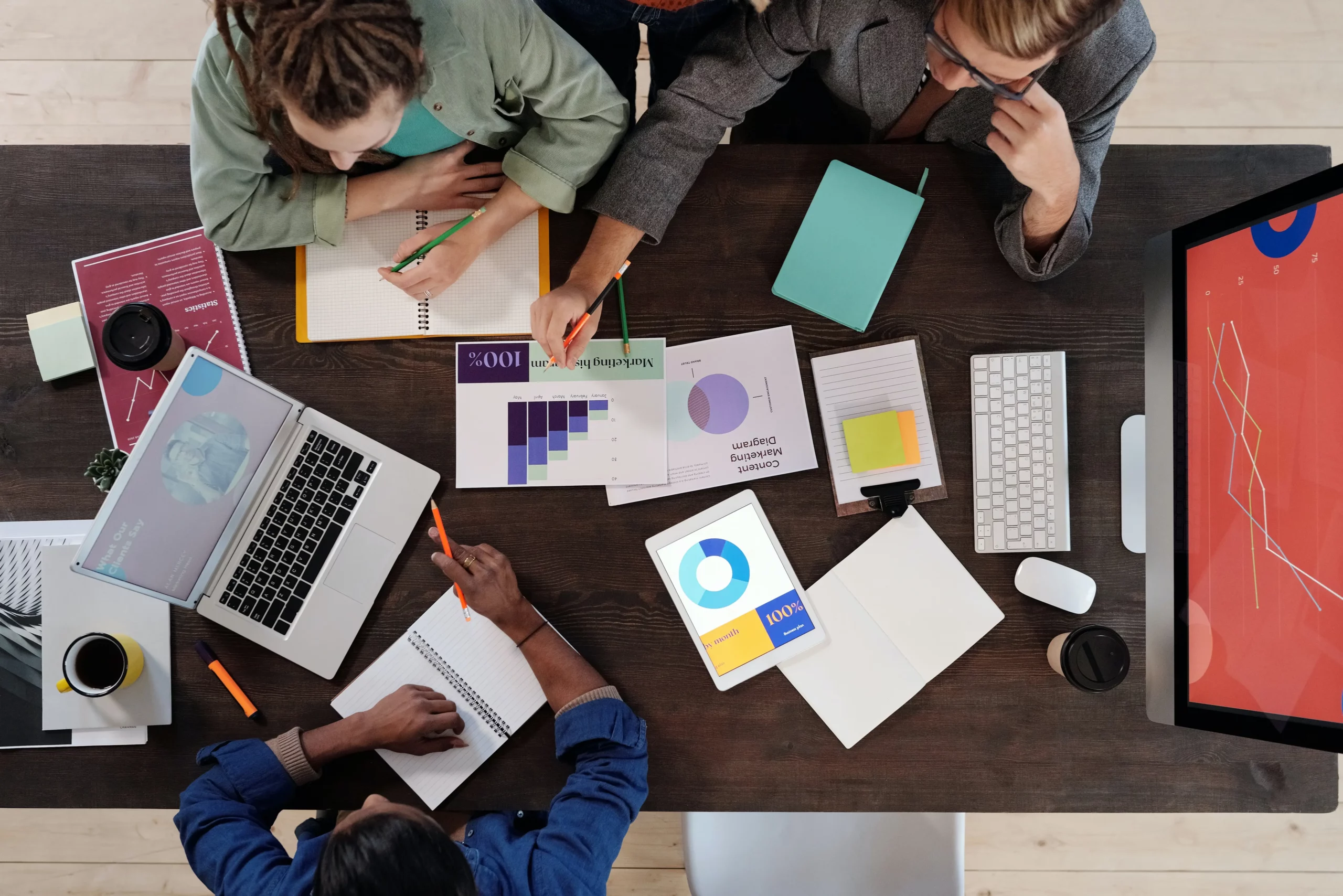 three people collaborating on a project